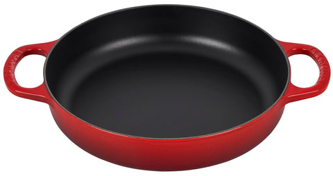 Le Creuset Cerise front view showing vibrant color and pan shape, durable finish benefit