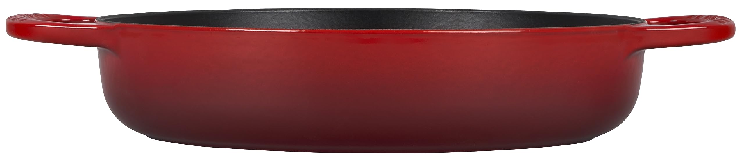 Le Creuset handle closeup with oversized grips for secure lifting benefit