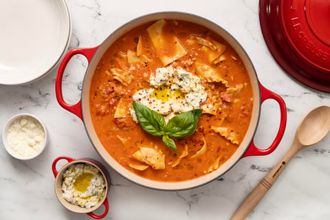 Le Creuset served on table illustrating oven-to-table presentation and durability