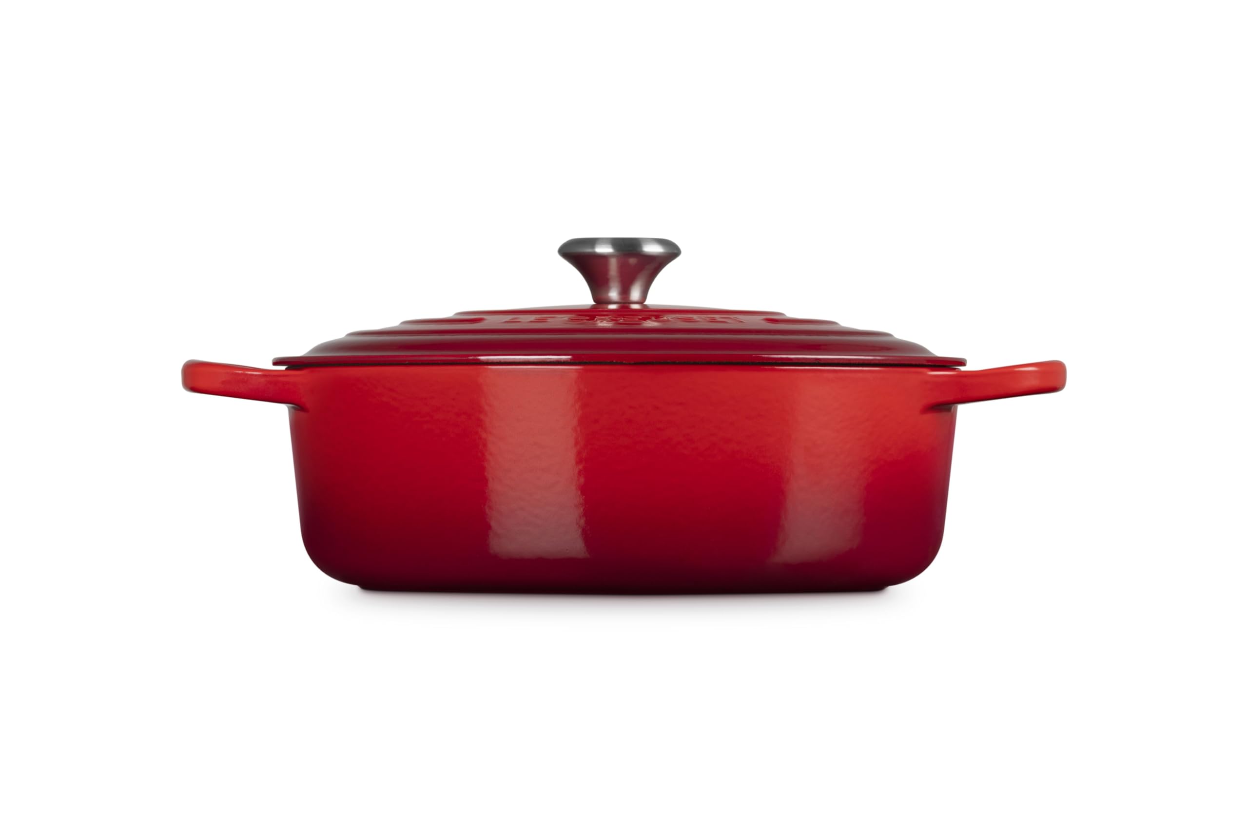 Le Creuset side profile highlighting wide base and shallow cooking surface benefit