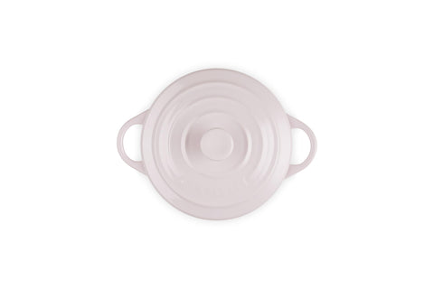 Le Creuset cocotte with freshly baked cobbler demonstrating even browning and serving readiness