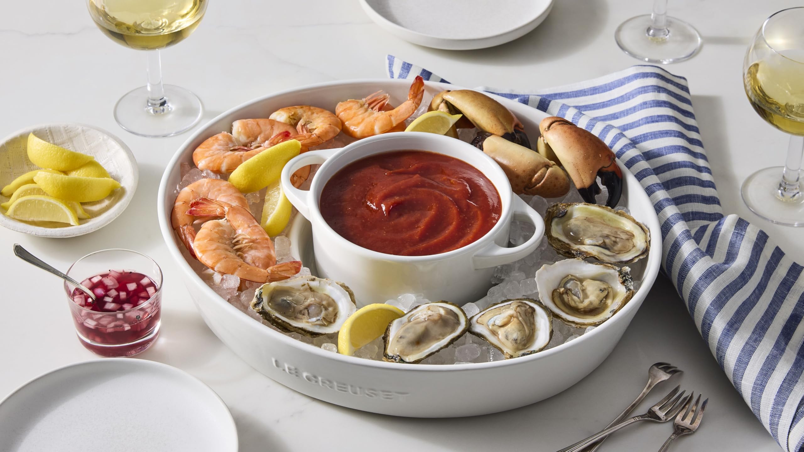 Le Creuset cocotte with ingredients nearby illustrating prep and storage convenience