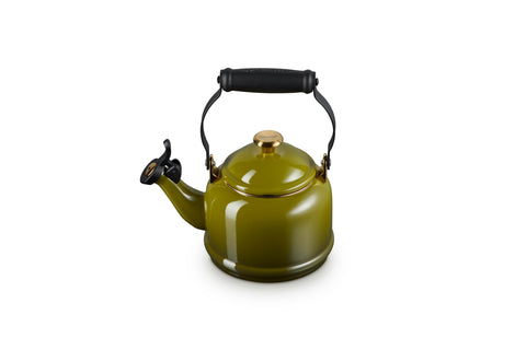 Le Creuset demi kettle front view showing olive enamel and compact shape, stylish accent