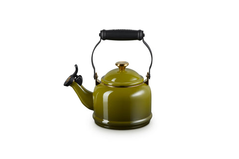 Le Creuset demi kettle whistle flipped open showing easy pouring and audible alert