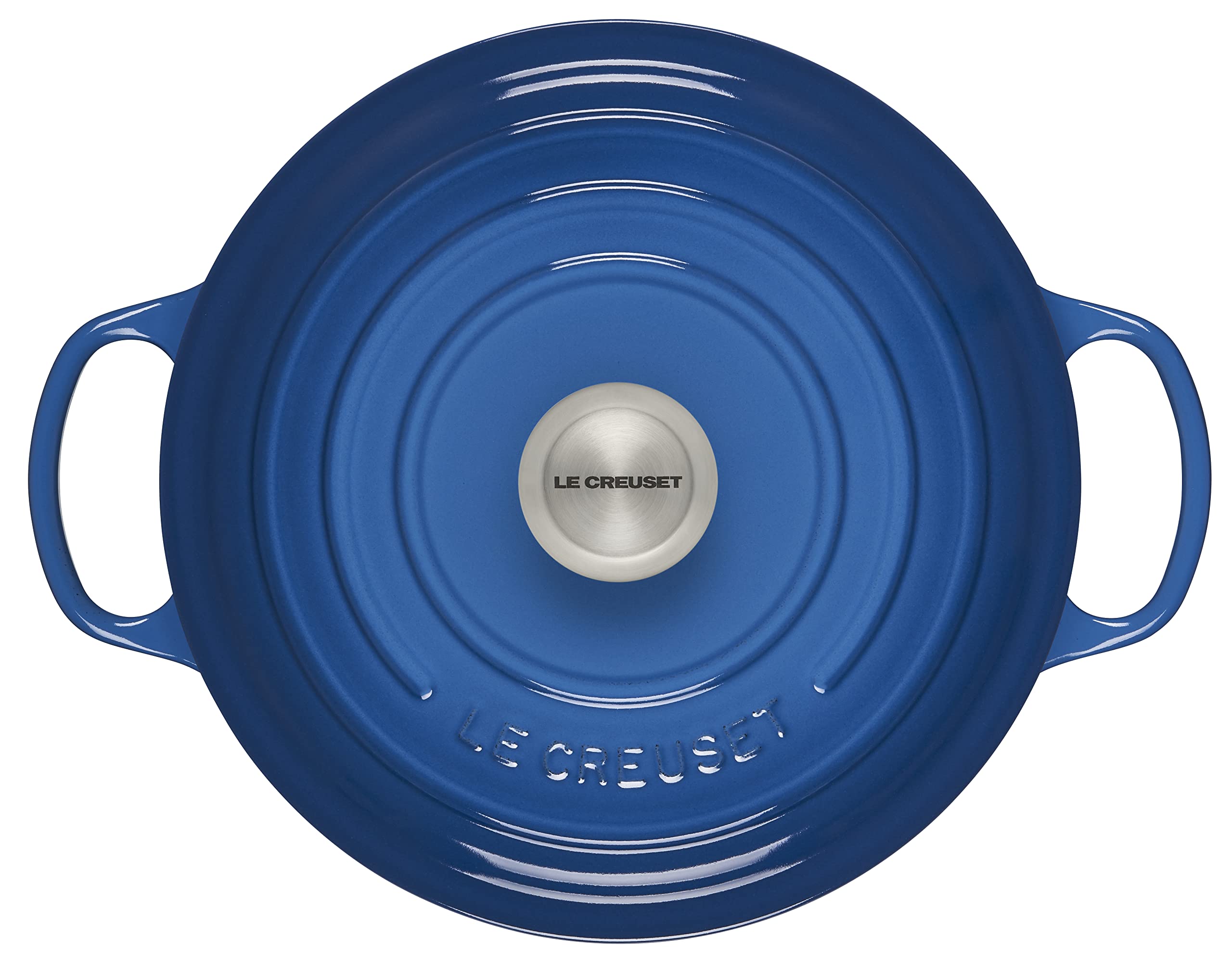 Le Creuset close-up of light enamel interior revealing smooth surface for easy monitoring benefit