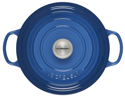 Le Creuset close-up of light enamel interior revealing smooth surface for easy monitoring benefit