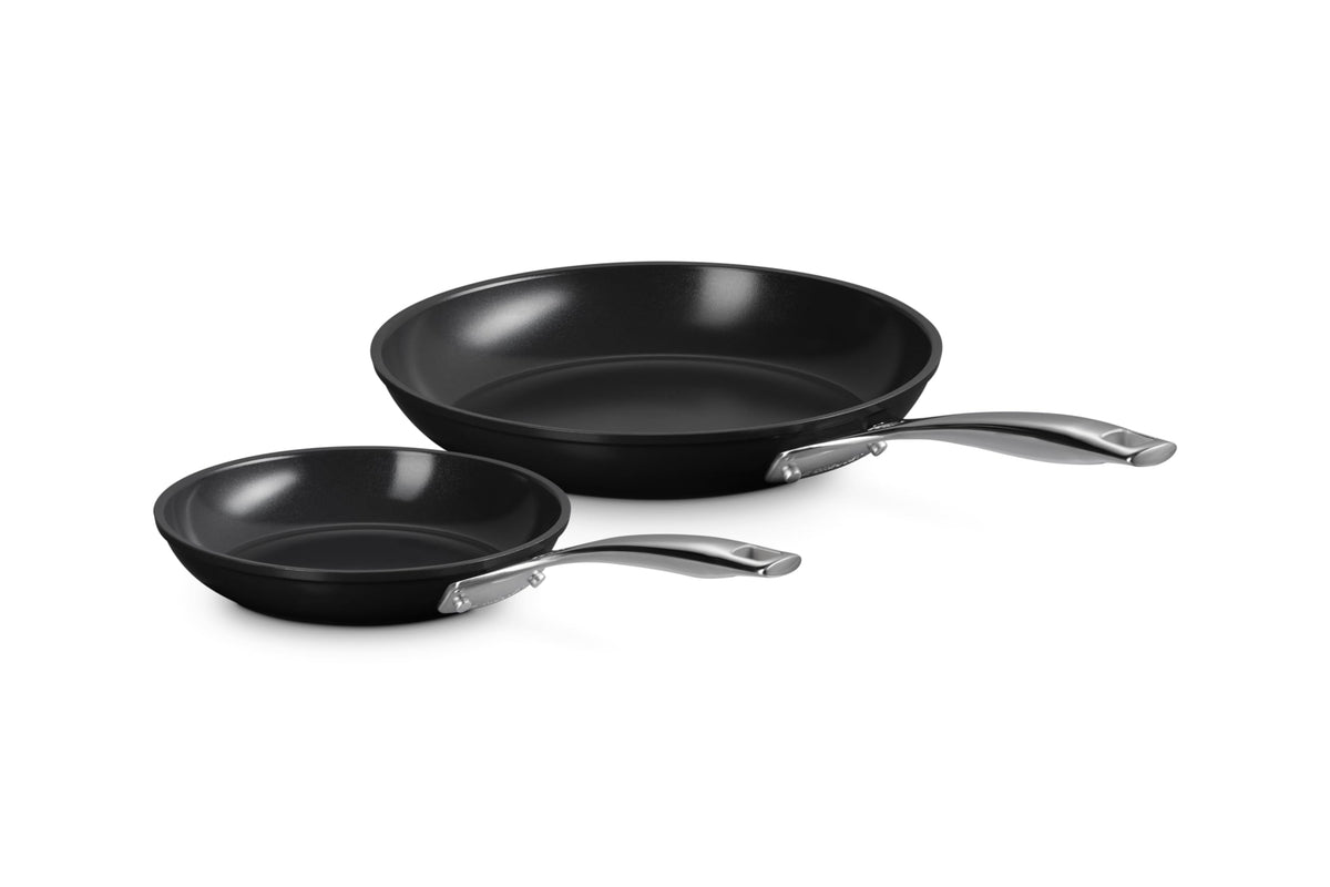 Le Creuset front view of both fry pans showing sizes and polished finish, reliable performance