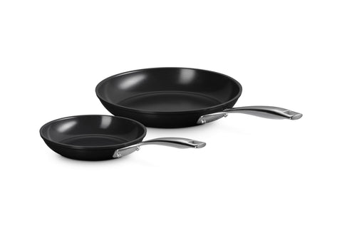 Le Creuset front view of both fry pans showing sizes and polished finish, reliable performance