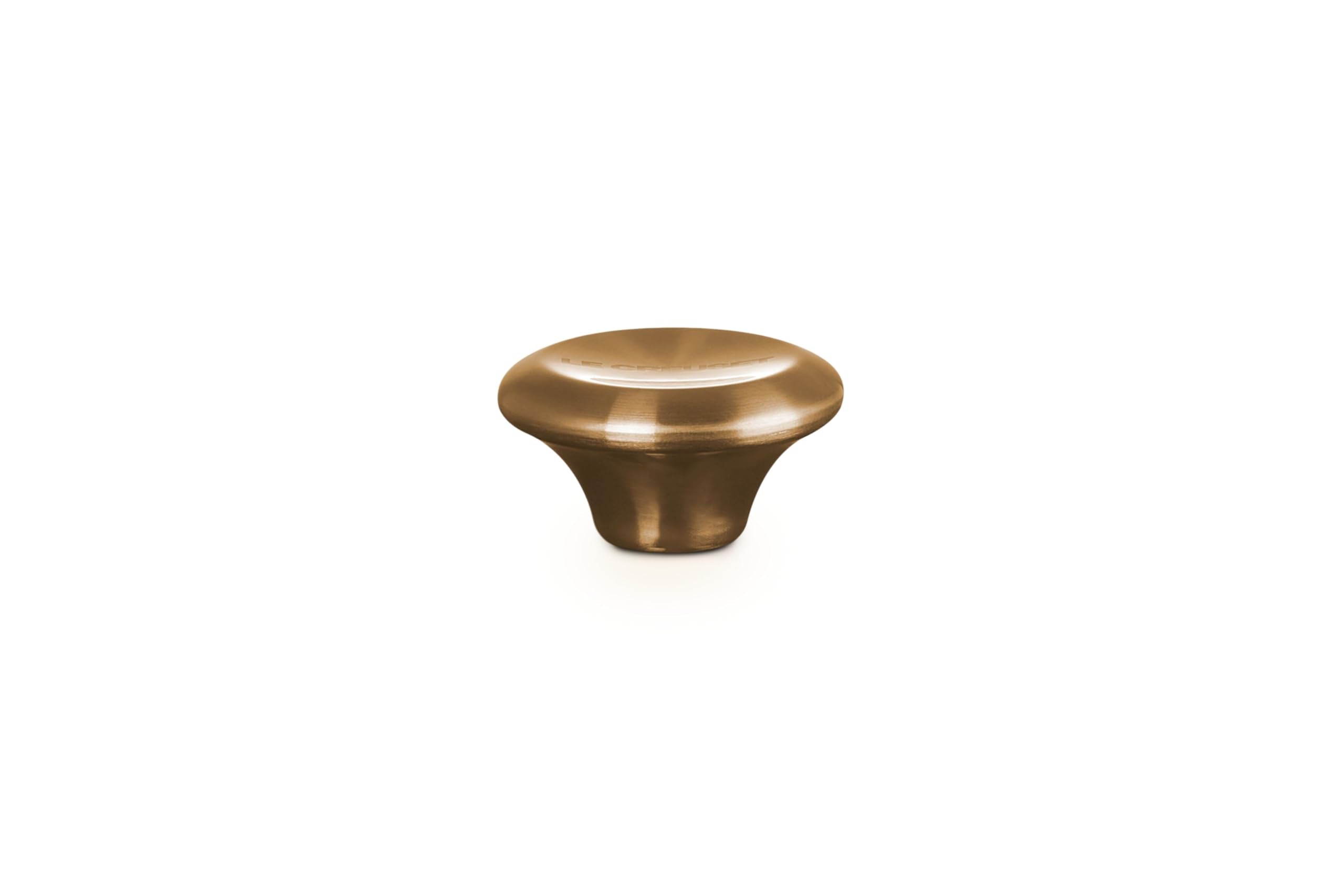 Le Creuset close-up of gold knob texture showing stainless steel detail and polish