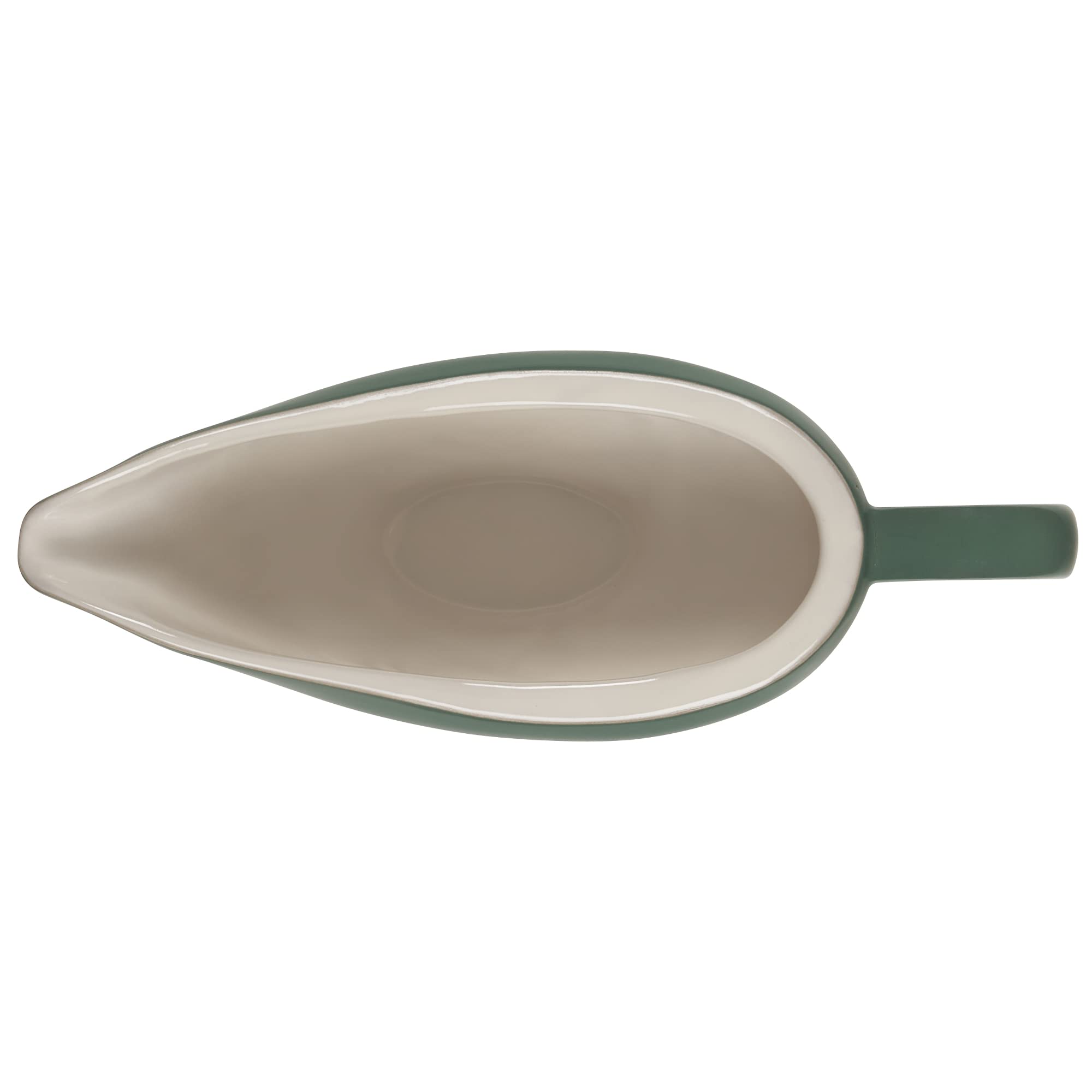 Le Creuset gravy boat in use on table serving sauce with easy grip and steady pour