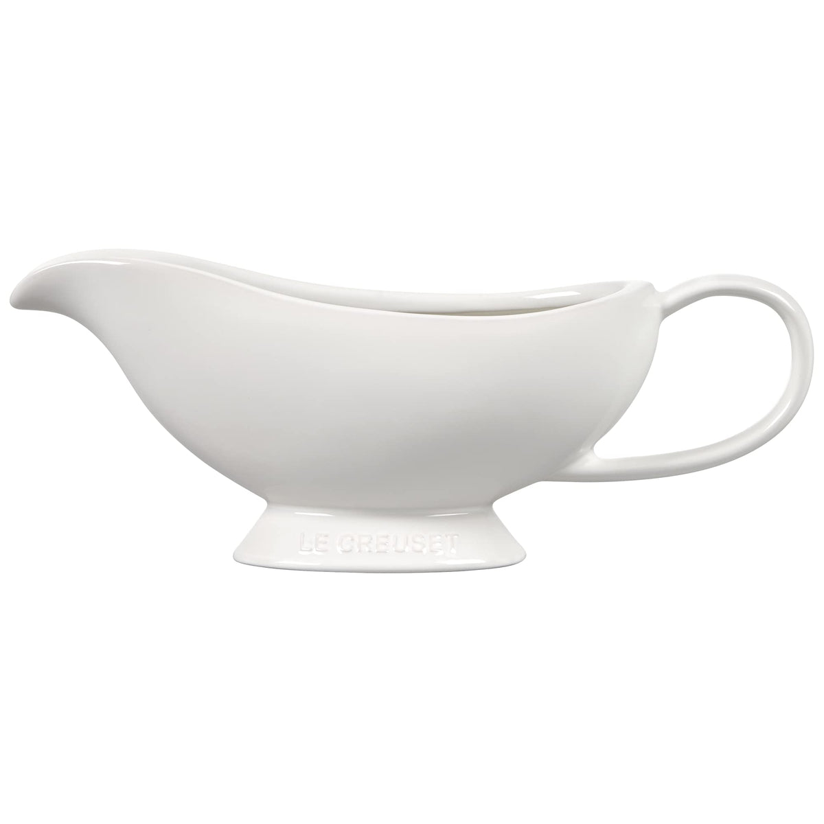 Le Creuset white gravy boat front view shows elegant shape and durable glaze