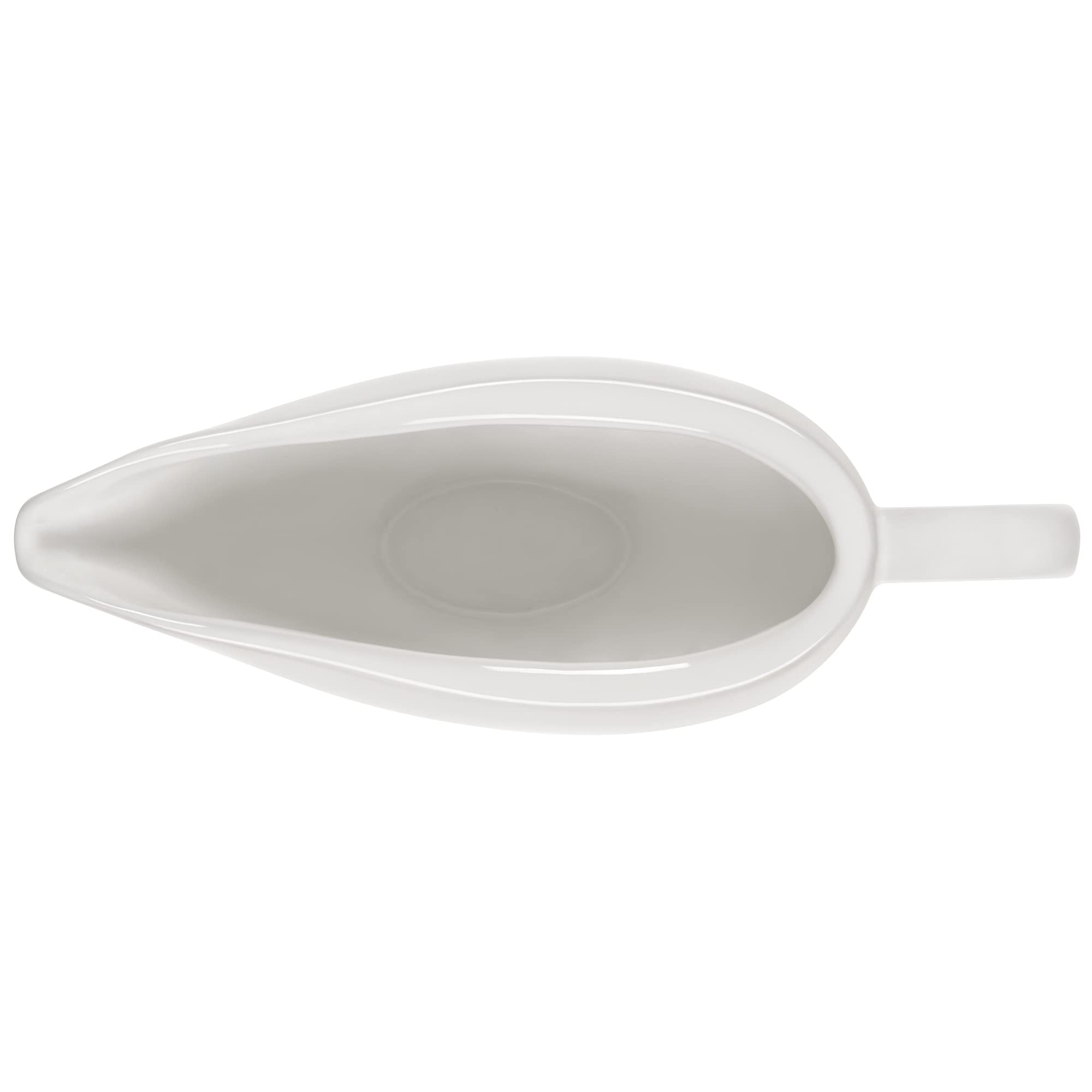 Le Creuset handle detail displaying comfortable grip for steady serving