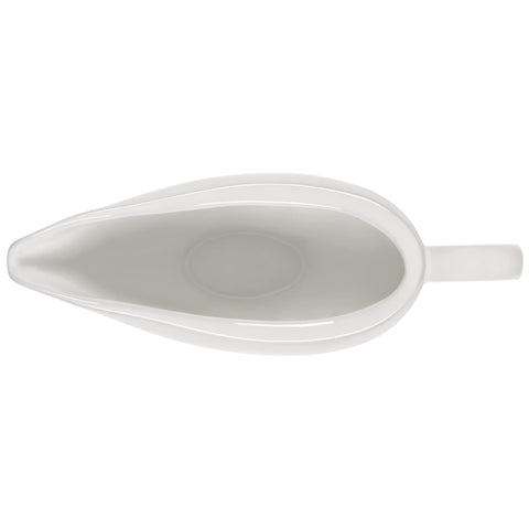 Le Creuset handle detail displaying comfortable grip for steady serving