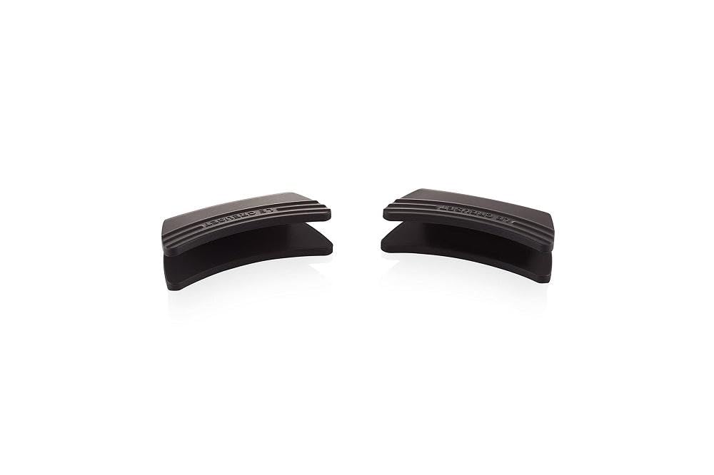 Le Creuset grips on cookware in kitchen setting improving comfort and safety