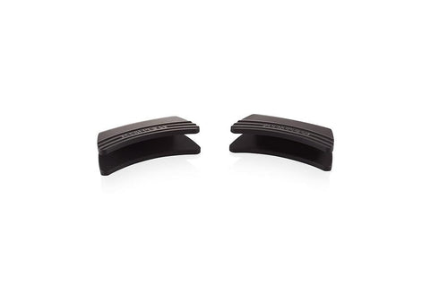 Le Creuset grips on cookware in kitchen setting improving comfort and safety