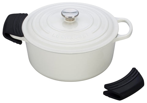Le Creuset grips fitted on cast-iron dutch oven handle for safer lifting
