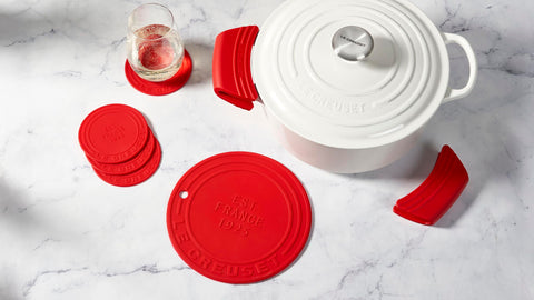 Le Creuset grips beside ruler showing 5-inch size for fit confirmation
