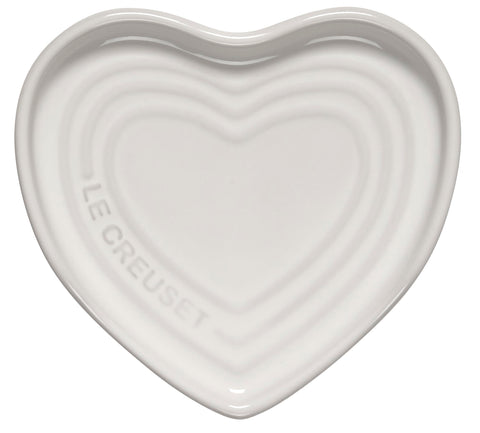 Le Creuset heart spoon rest front view showing elegant white glaze and tidy utensil storage