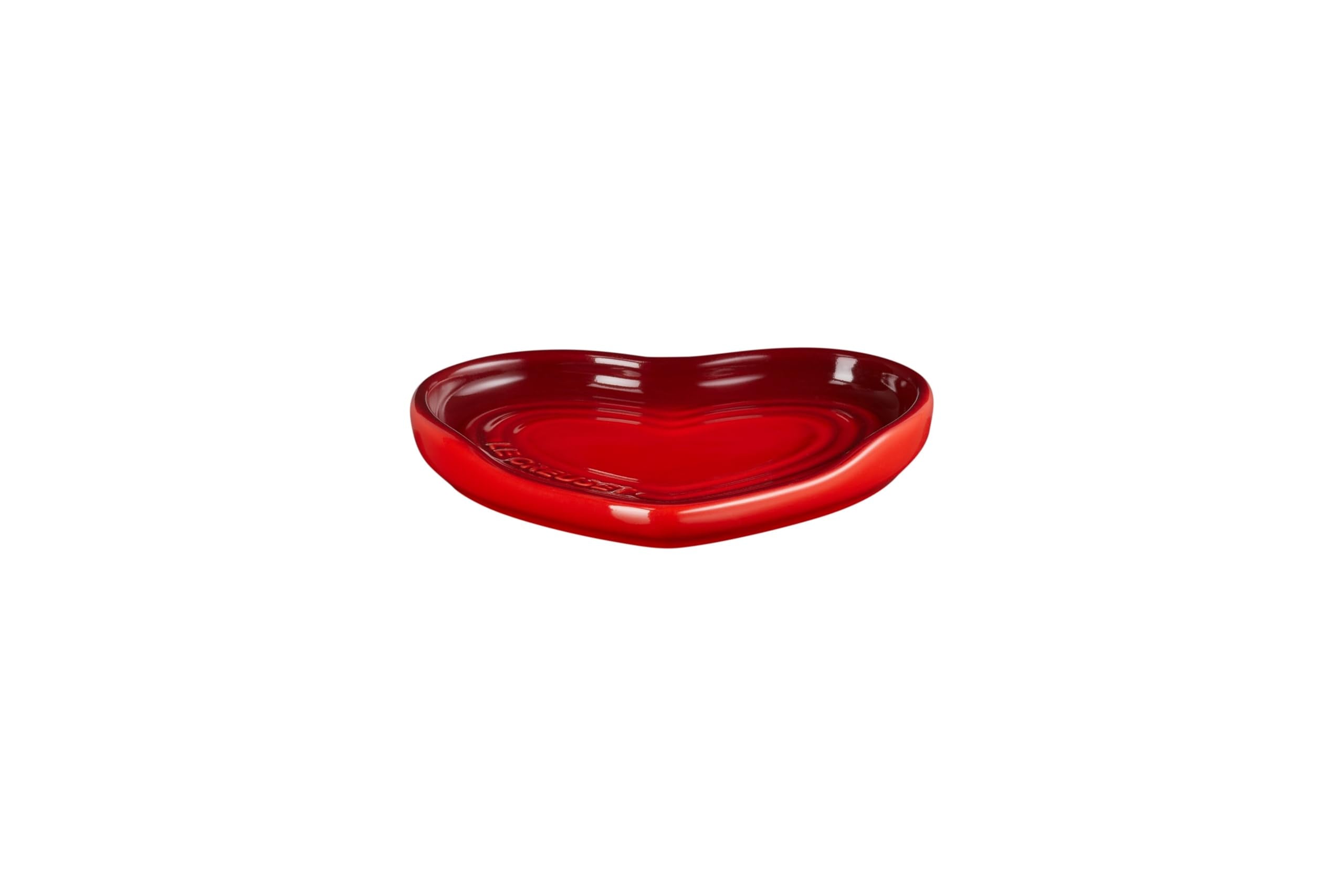 Le Creuset spoon rest side profile highlighting sturdy stoneware and stable support benefit
