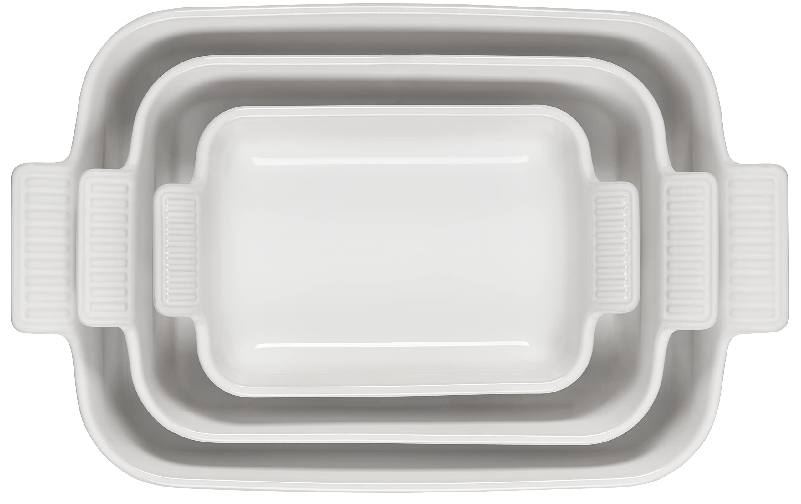 Le Creuset dishes roasting vegetables in oven demonstrating even heat distribution and browning