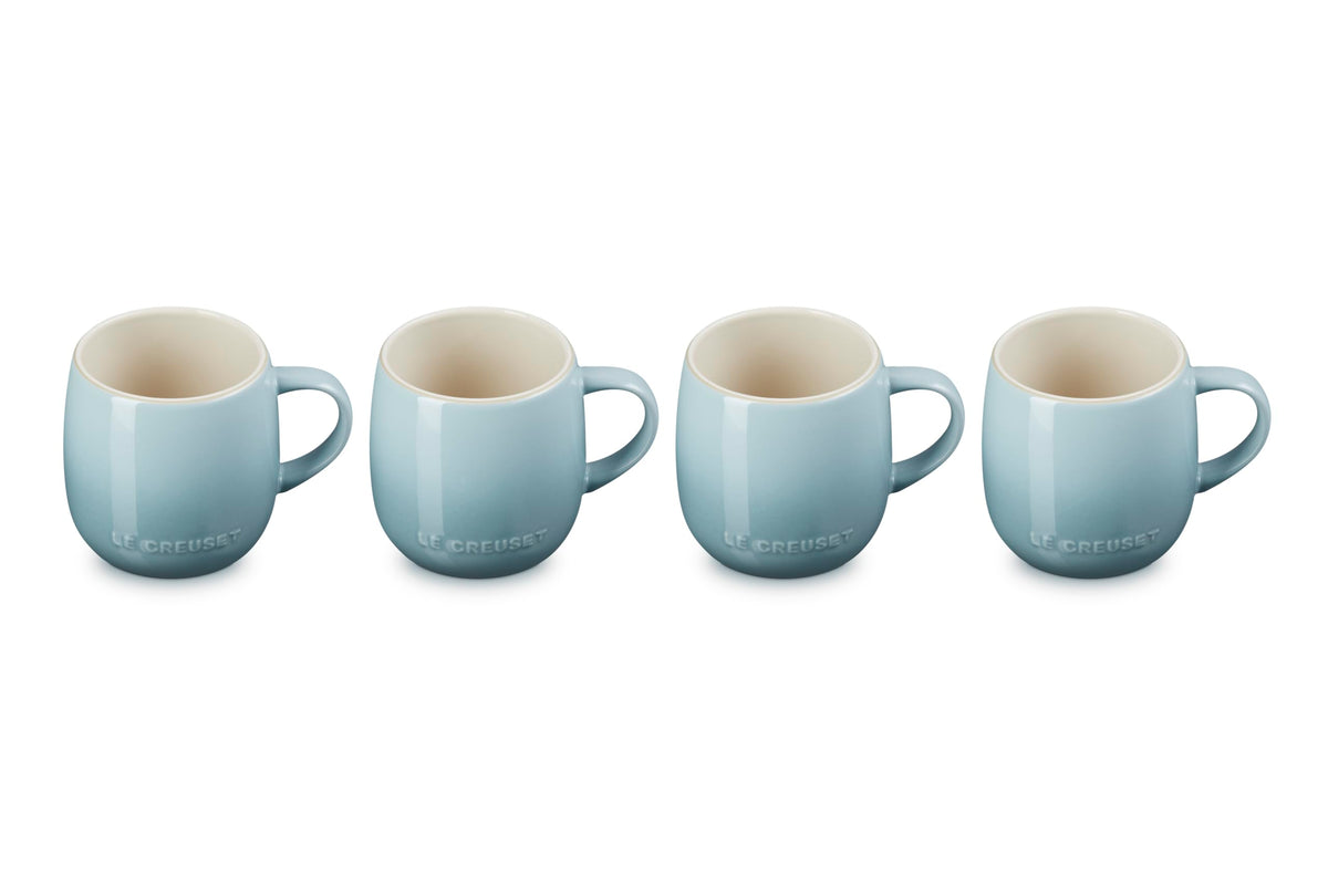 Le Creuset front view of four Sea Salt mugs showing elegant table presence