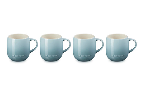Le Creuset stacked mugs from the side illustrating space-saving storage benefit
