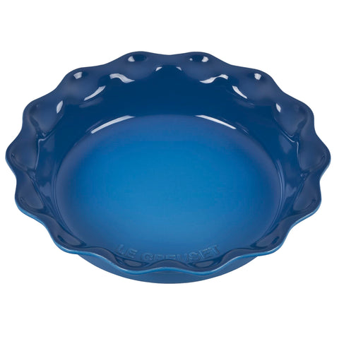 Le Creuset Heritage Pie Dish front view showing scalloped rim and Marseille color, elegant serving