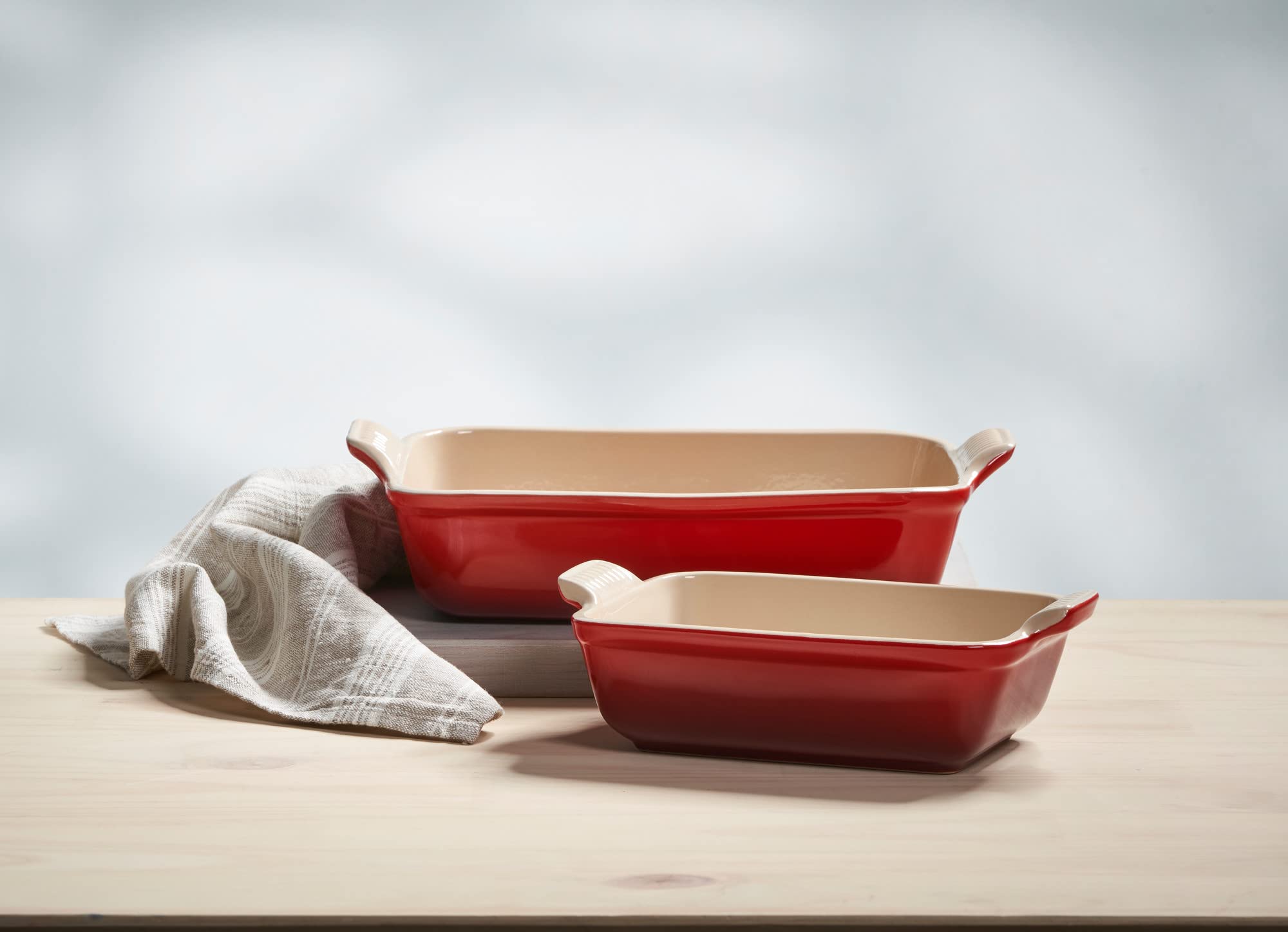 Le Creuset Cerise dish on table with roasted vegetables showing attractive serving presentation