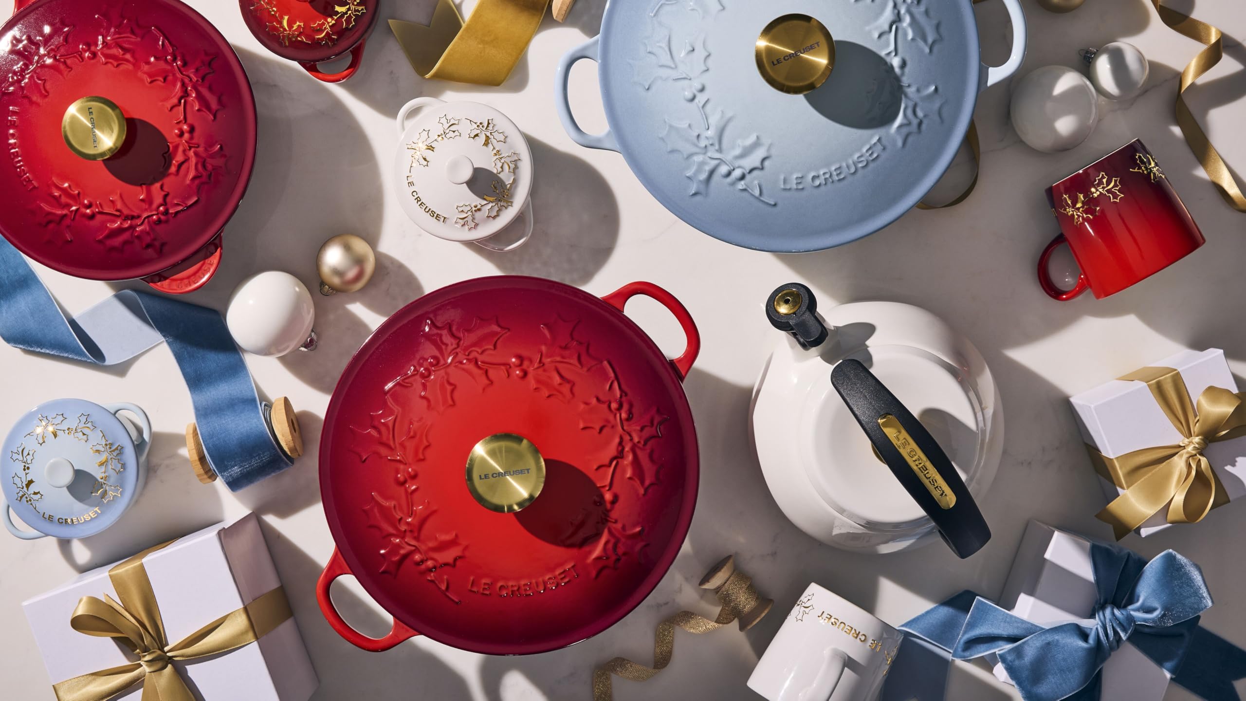 Le Creuset cocotte styled on holiday table adding color and elegant presentation