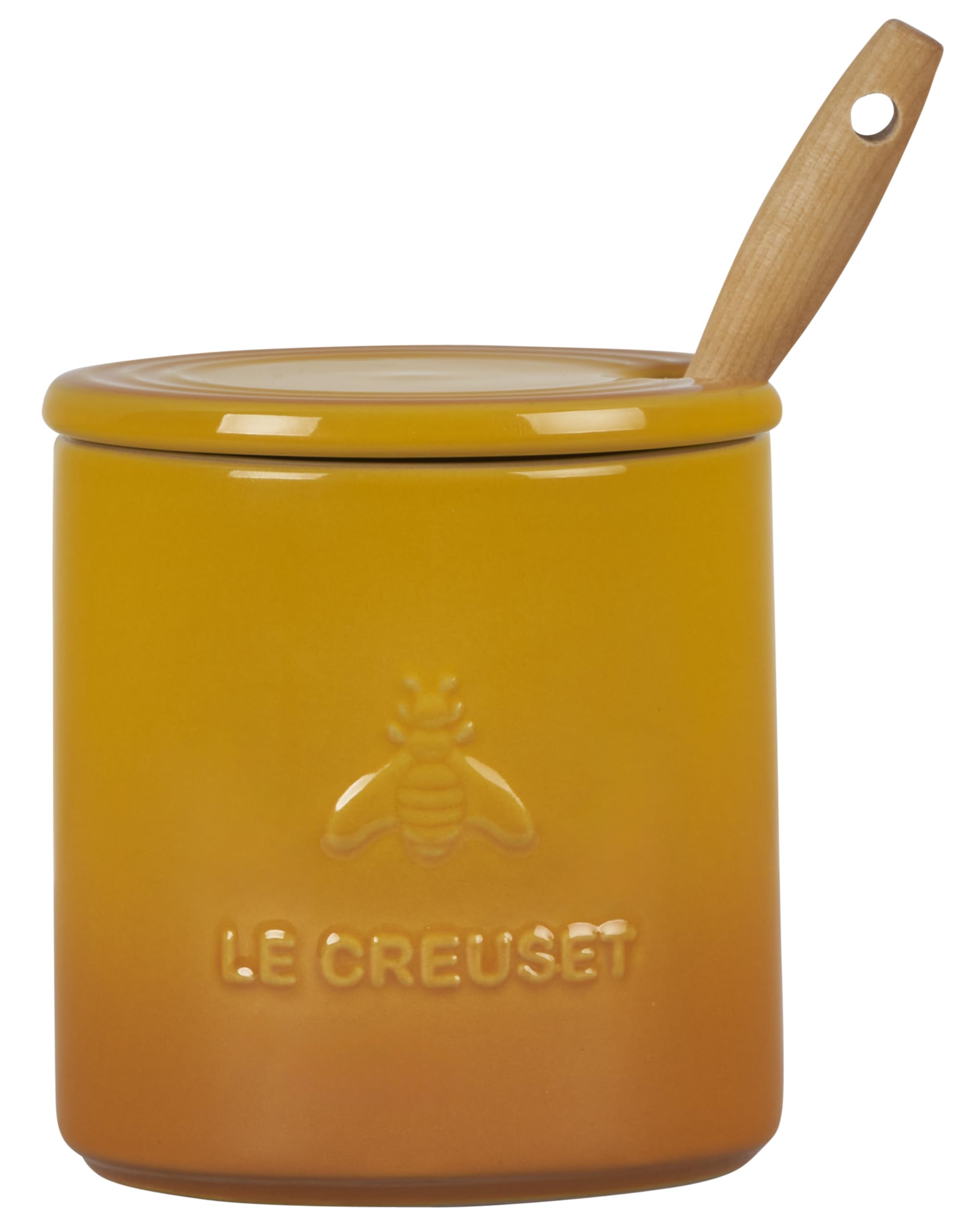 Le Creuset honey pot next to a mug showing compact 14 oz scale