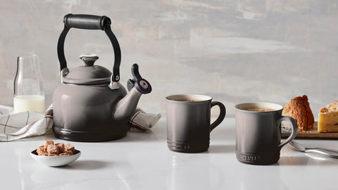 Le Creuset kettle on stovetop in kitchen lifestyle scene adding color and function