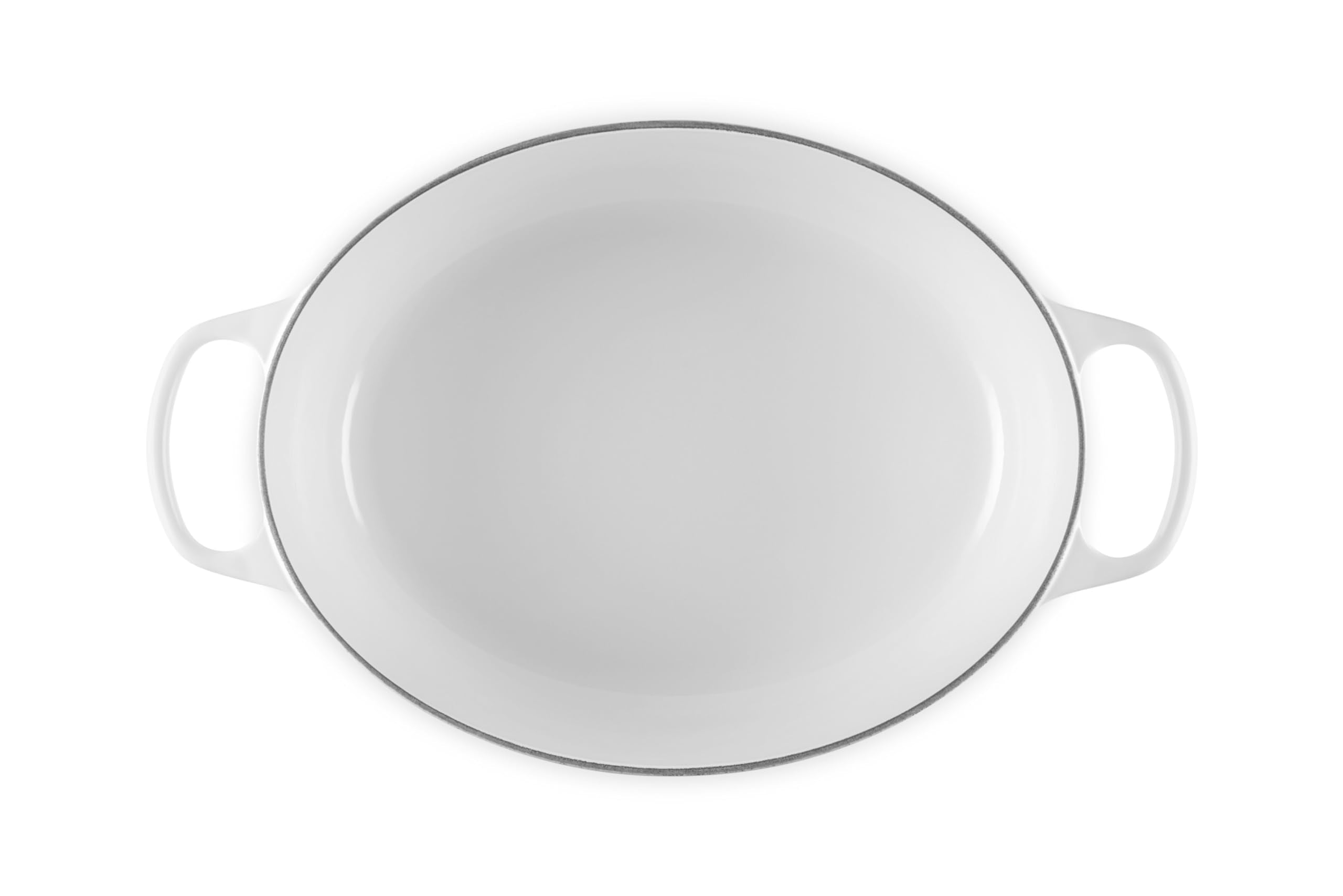 Le Creuset interior enamel detail revealing smooth light surface for monitoring