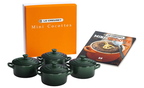 Le Creuset front view of four Artichaut mini cocottes showing color and lids, attractive serving