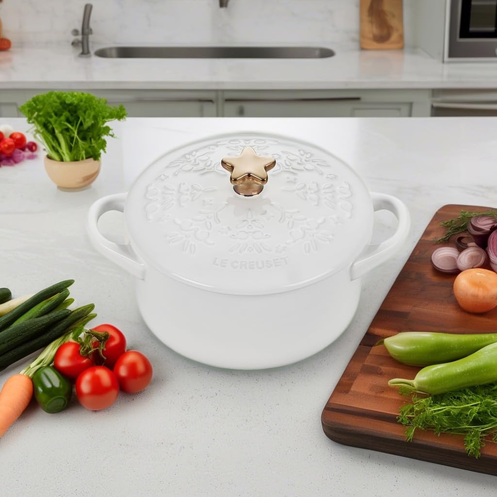 Le Creuset mini cocotte styled on a holiday kitchen counter conveying festive atmosphere and versatility