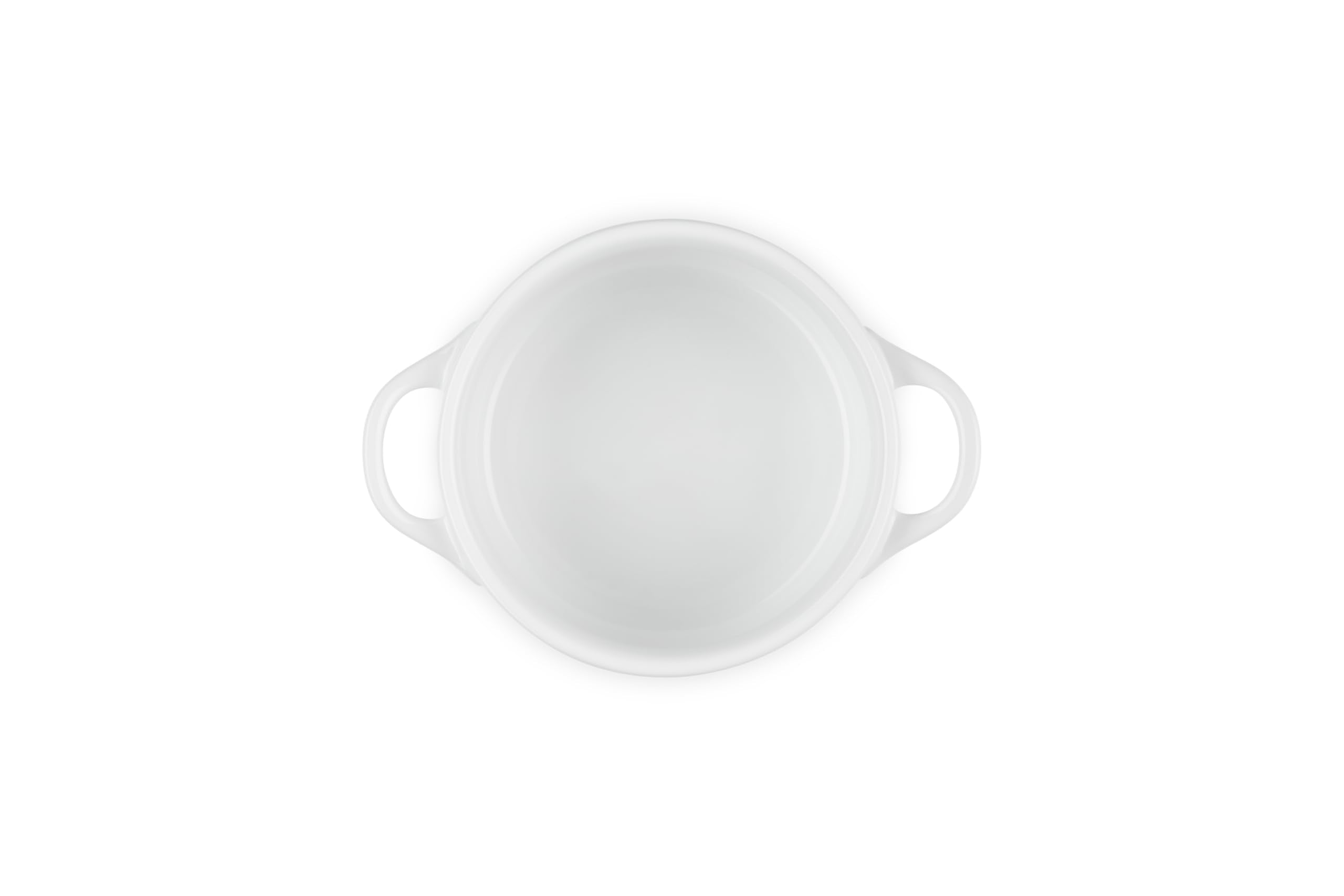 Le Creuset star knob close-up dipped in gold highlighting decorative focal point and luxury finish