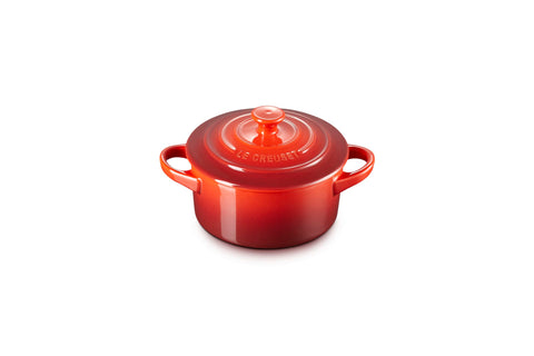 Le Creuset mini cocotte open top view showing interior surface and even cooking benefit
