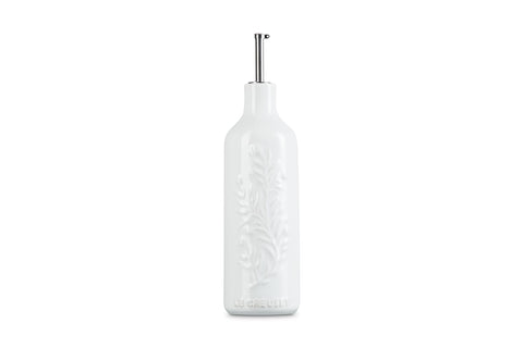 Le Creuset embossed olive branch detail highlighting tactile decorative motif