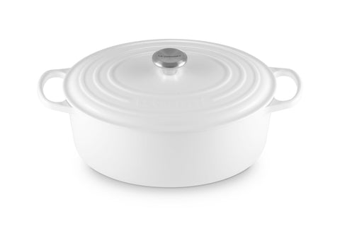Le Creuset front view showing oval shape and white finish, kitchen-ready