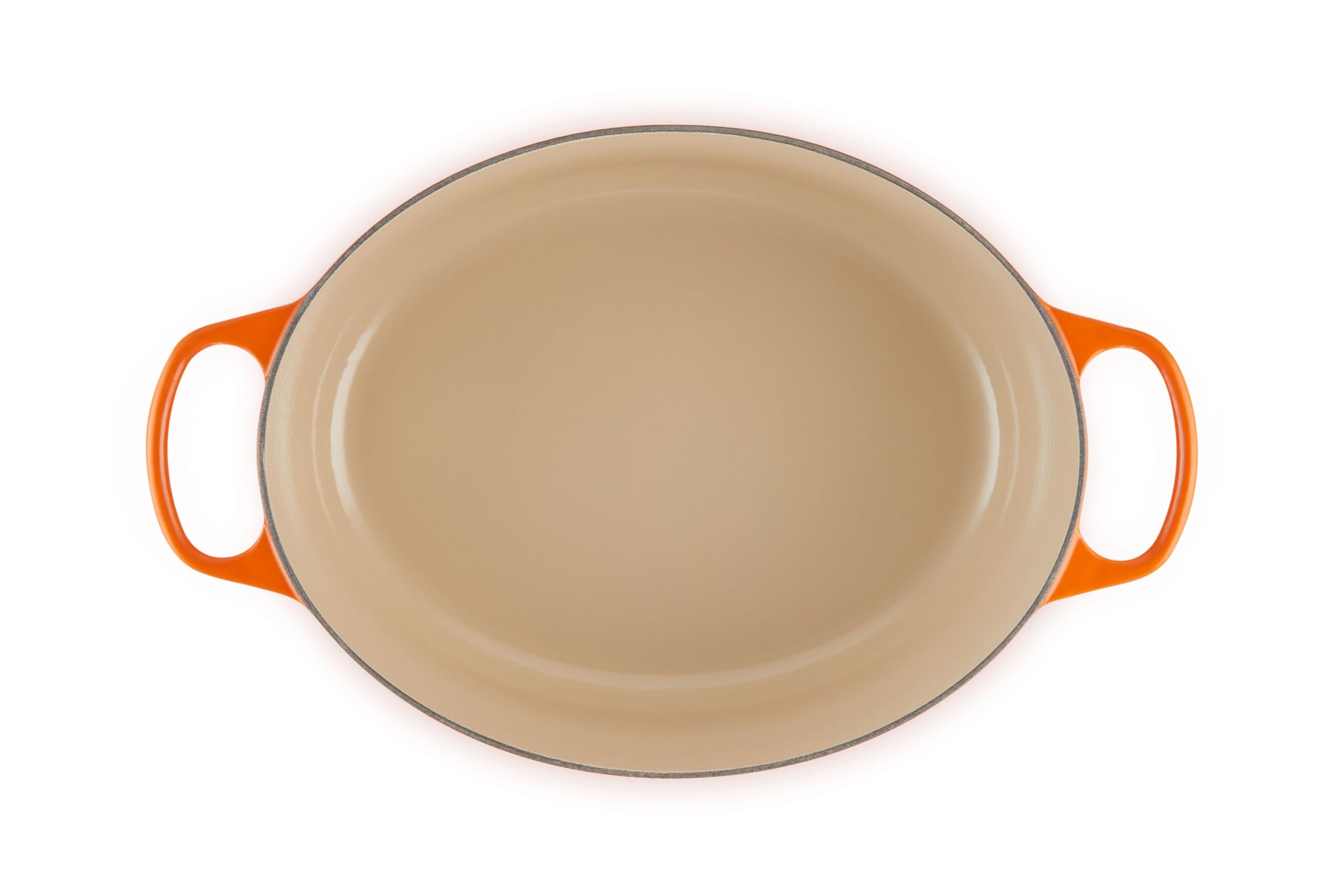 Le Creuset oval Dutch oven interior light enamel showing easy monitoring benefit