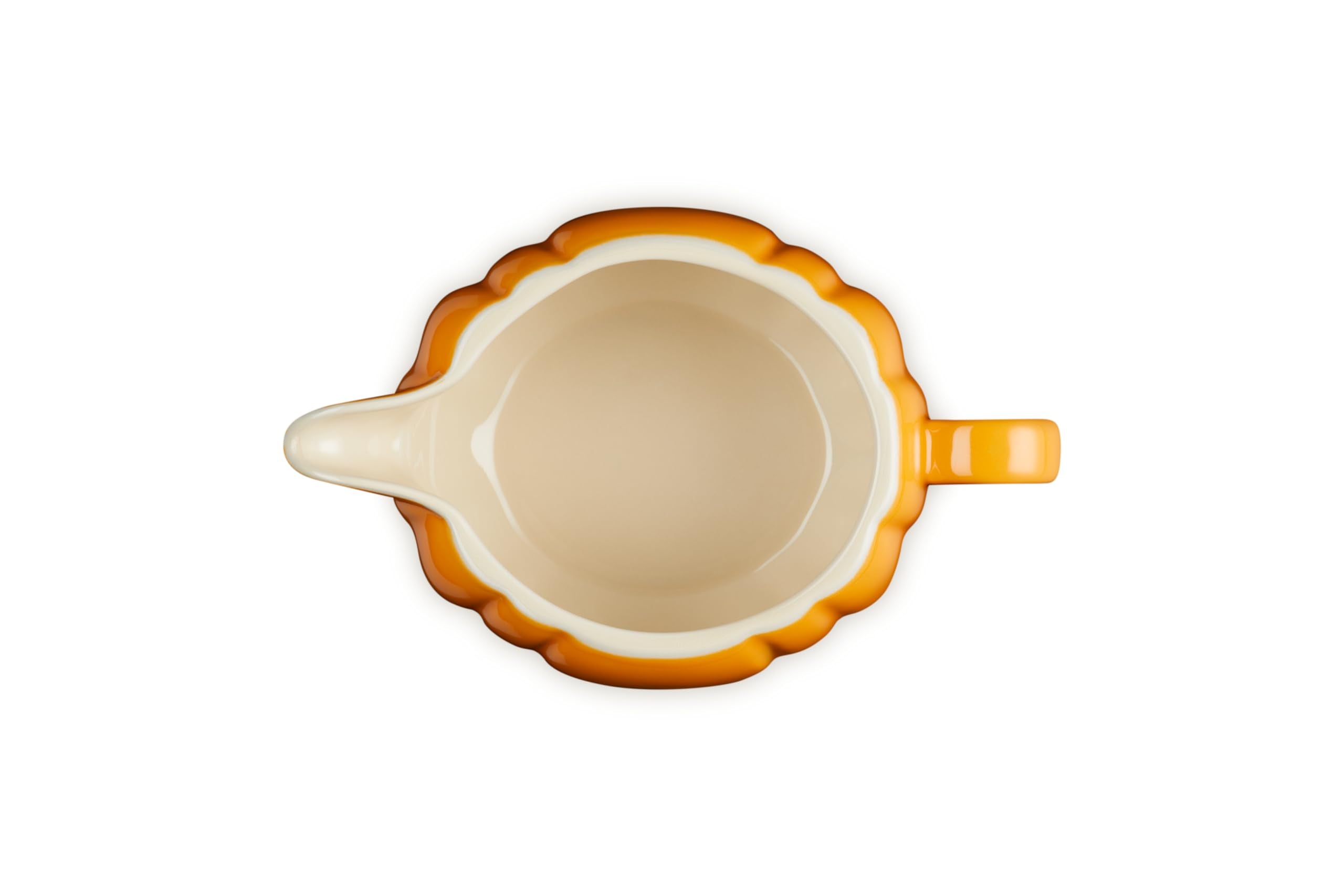 Le Creuset glazed interior showing smooth nonporous surface for easy cleaning