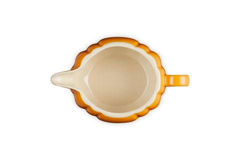 Le Creuset glazed interior showing smooth nonporous surface for easy cleaning