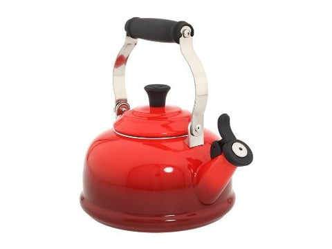 Le Creuset pouring action image showing controlled pour and ergonomic handling