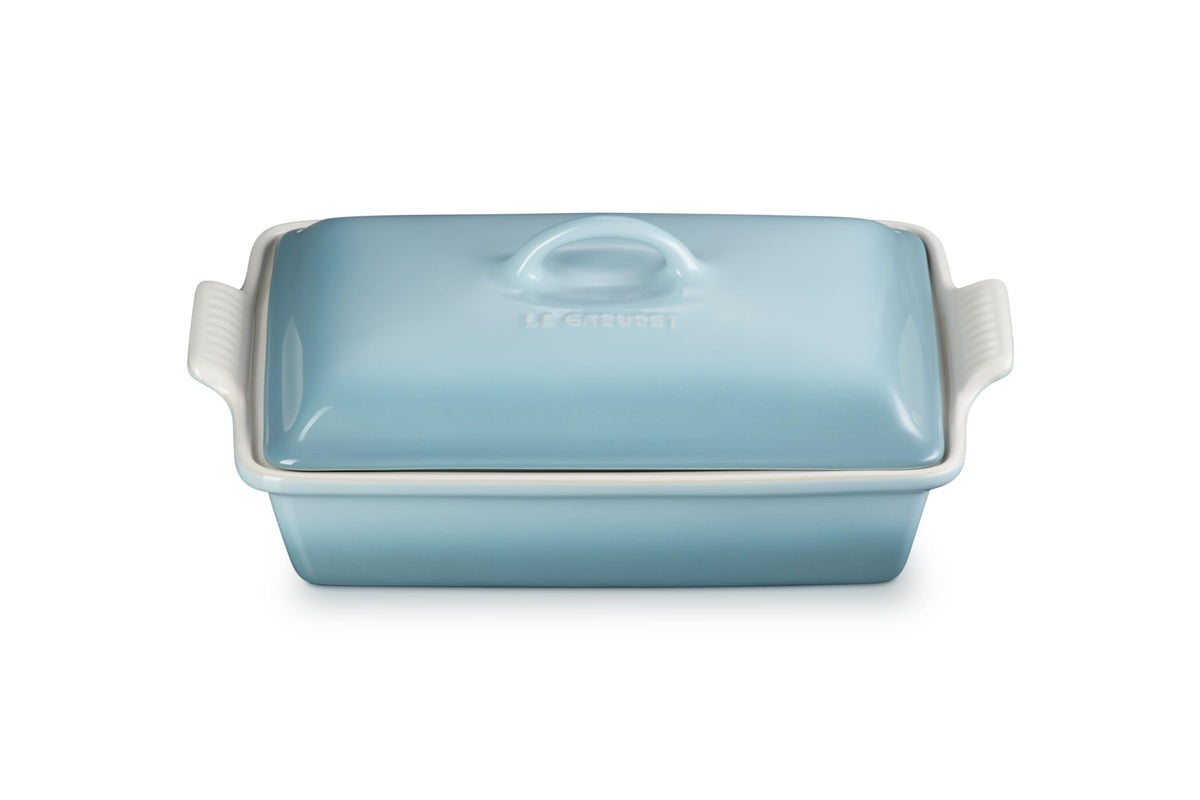 Le Creuset front view of rectangular casserole showing shape and Sea Salt finish benefits serving