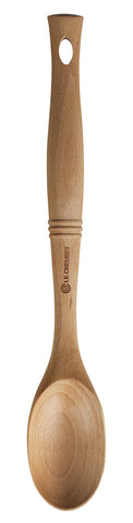 Le Creuset wood spoon front view showing elliptical grip and smooth beech finish for comfort