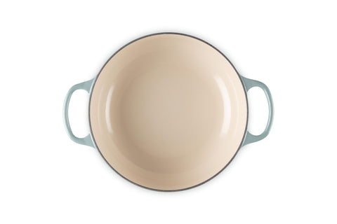 Le Creuset side angle with dome lid in place showing sealed moisture retention benefit
