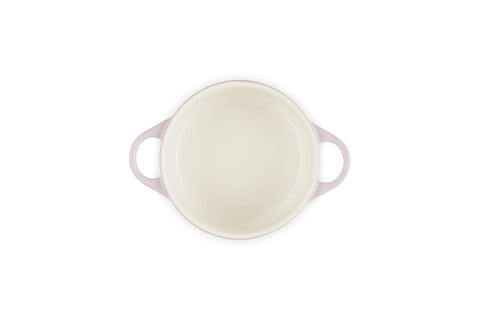 Le Creuset cocotte held in hand conveying compact size and easy portion control