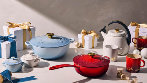 Le Creuset cocotte beside spoon for scale showing compact 8 oz capacity