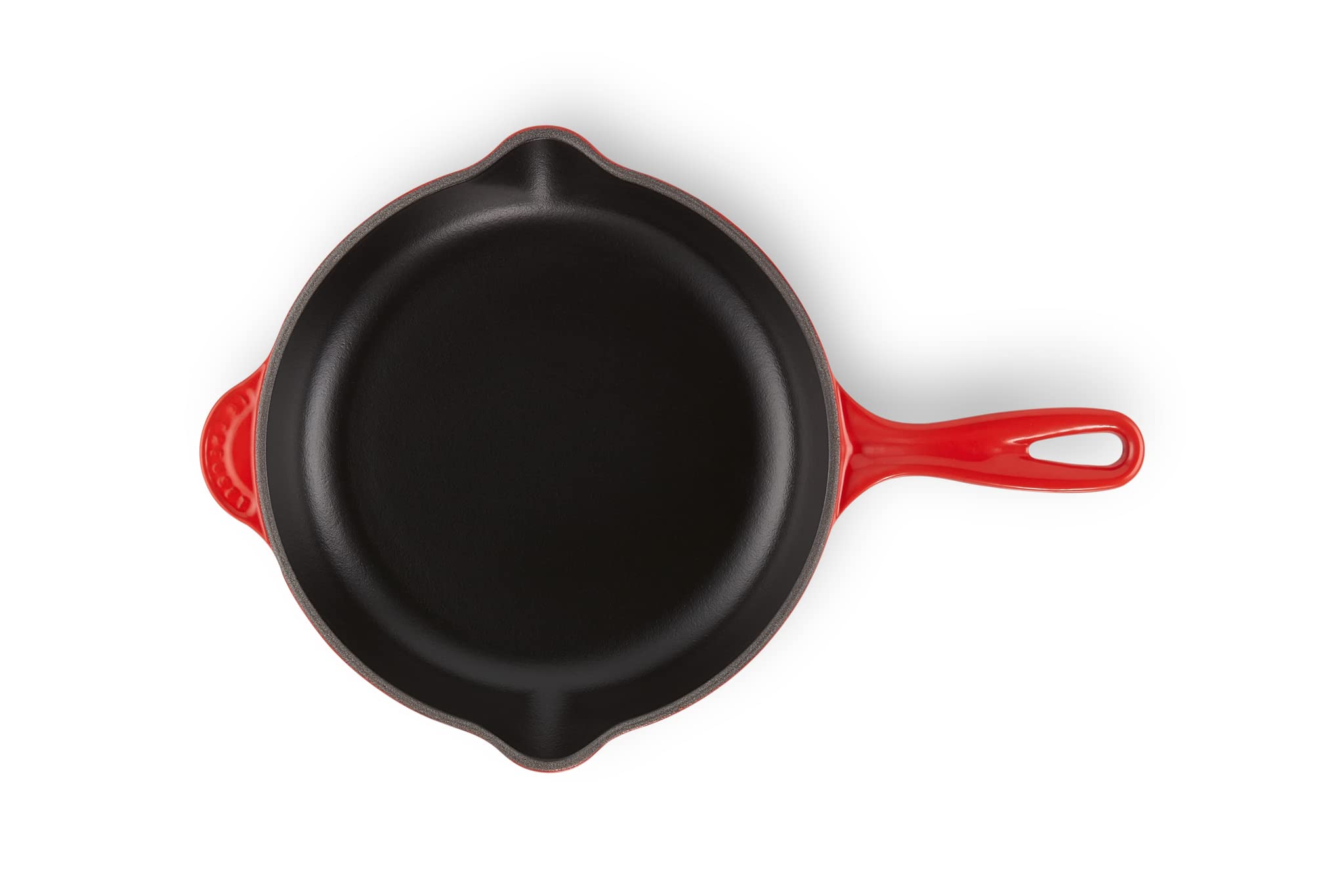 Le Creuset close-up of black satin interior enamel highlighting searing performance