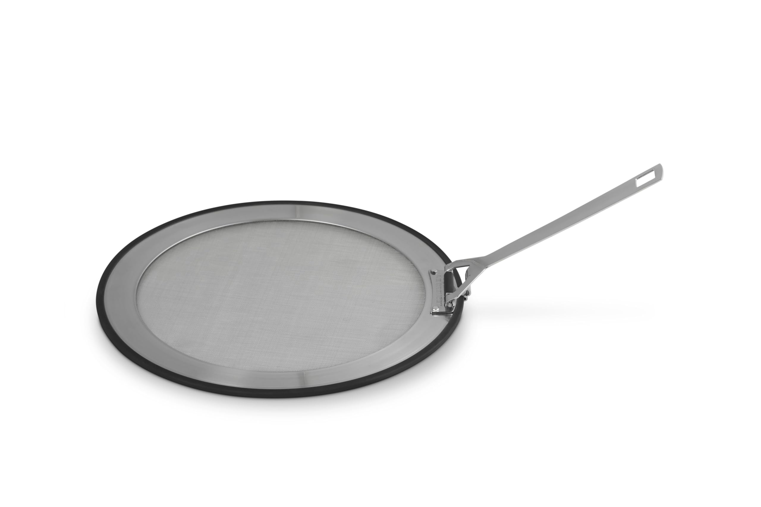 Le Creuset splatter guard front view showing full coverage and sleek rim