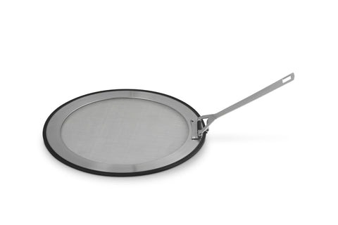 Le Creuset splatter guard front view showing full coverage and sleek rim